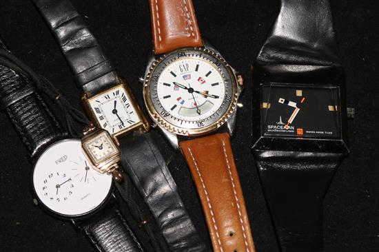 A ladys 9ct gold wrist watch and four other wrist watches.